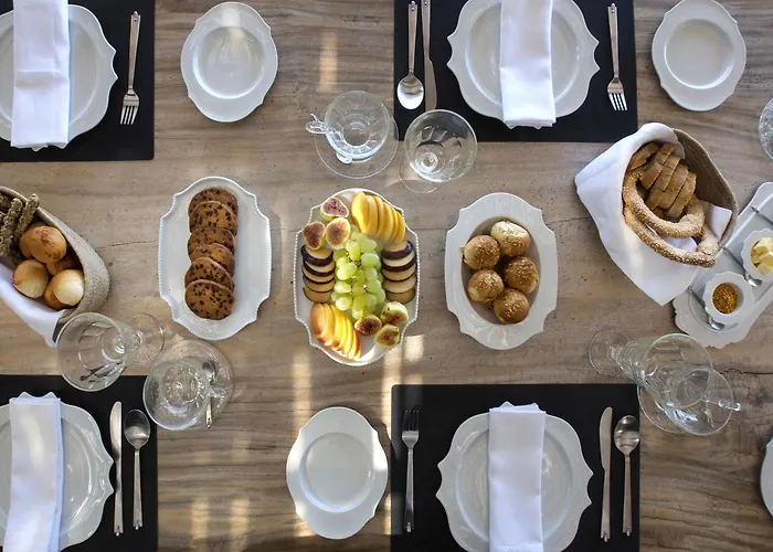 منتجع Erosantorini Luxury Private Estate & Suites 4*